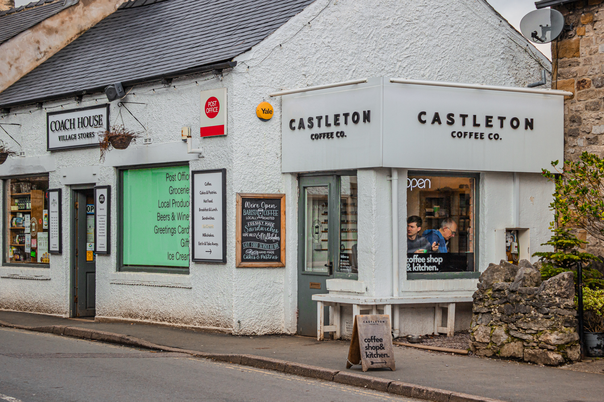 An exterior shot of Castleton Coffee Co. and Coachhouse Stores