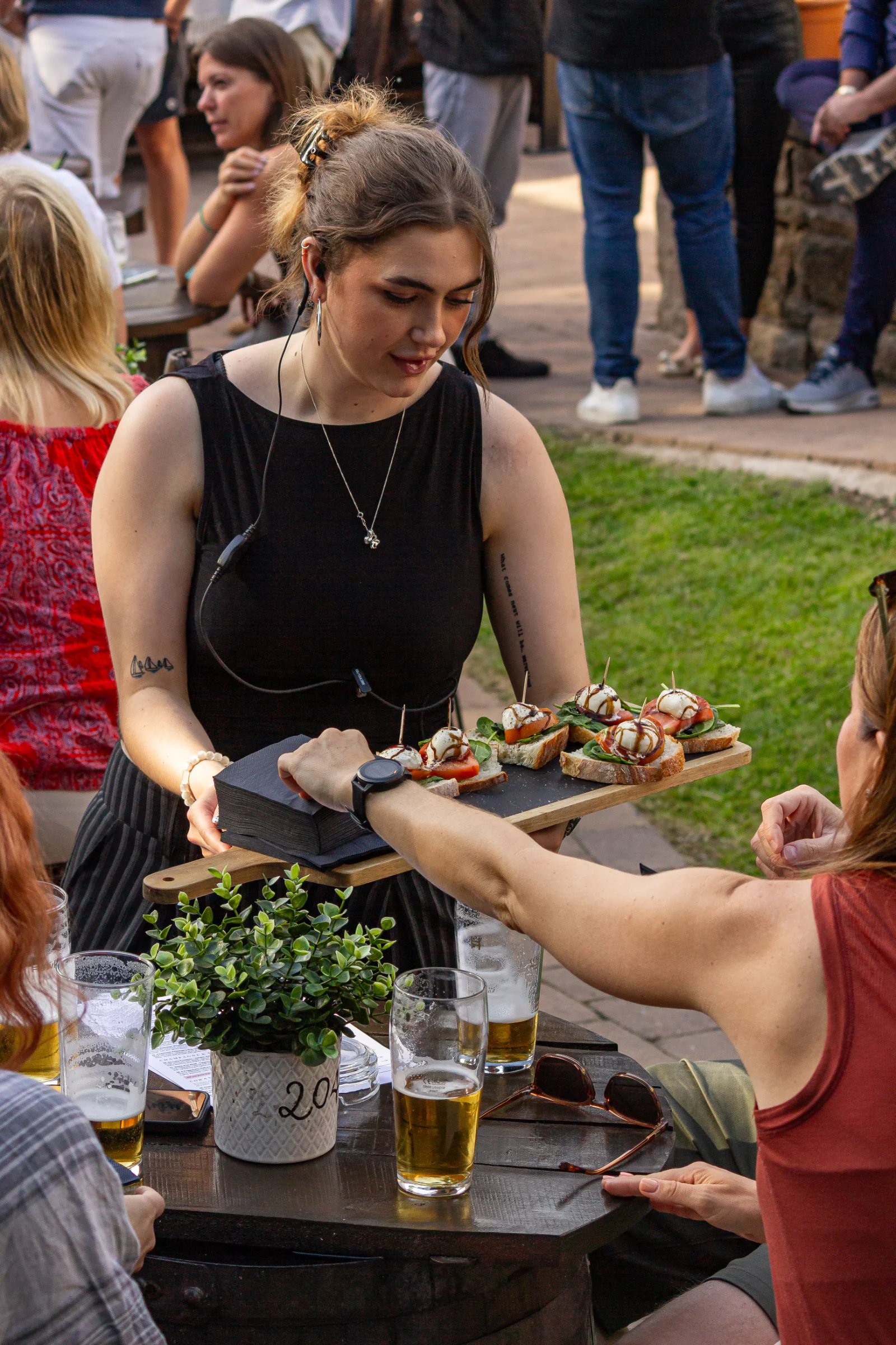 Canapés and pintxos being served at Vintners on the Brook's courtyard
